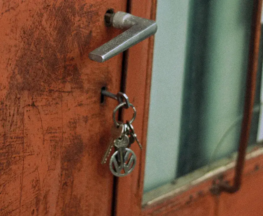 Keys hanging from the lock of an old door – why keys snap and when broken key removal Sheffield is needed, Locksmith Sheffield